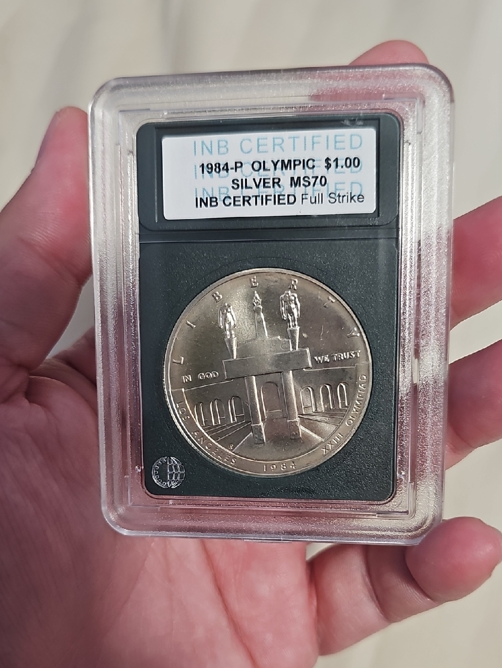 1984-P Olympic 99.99 Silver $1 INB Certified MS70